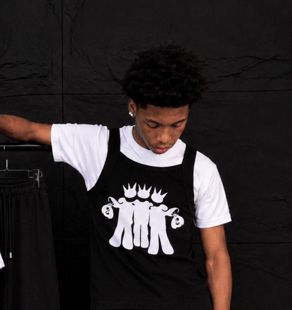 Rahmany11 wearing the Bloody Boys logo tank over a white tee
